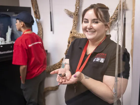 Cori Cantin holds a whip scorpion